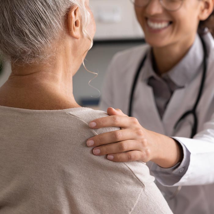 doctor comforting patient