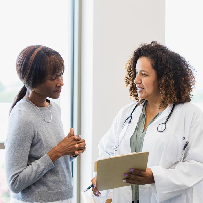 doctor talking to patient