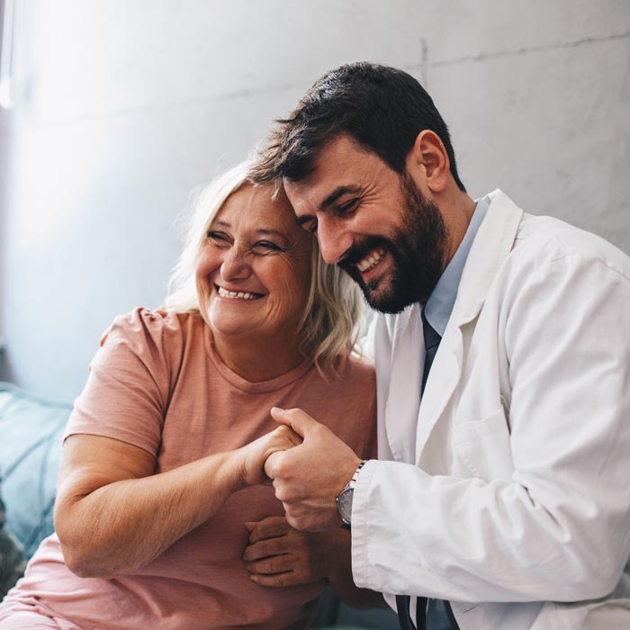 doctor smiling with patient